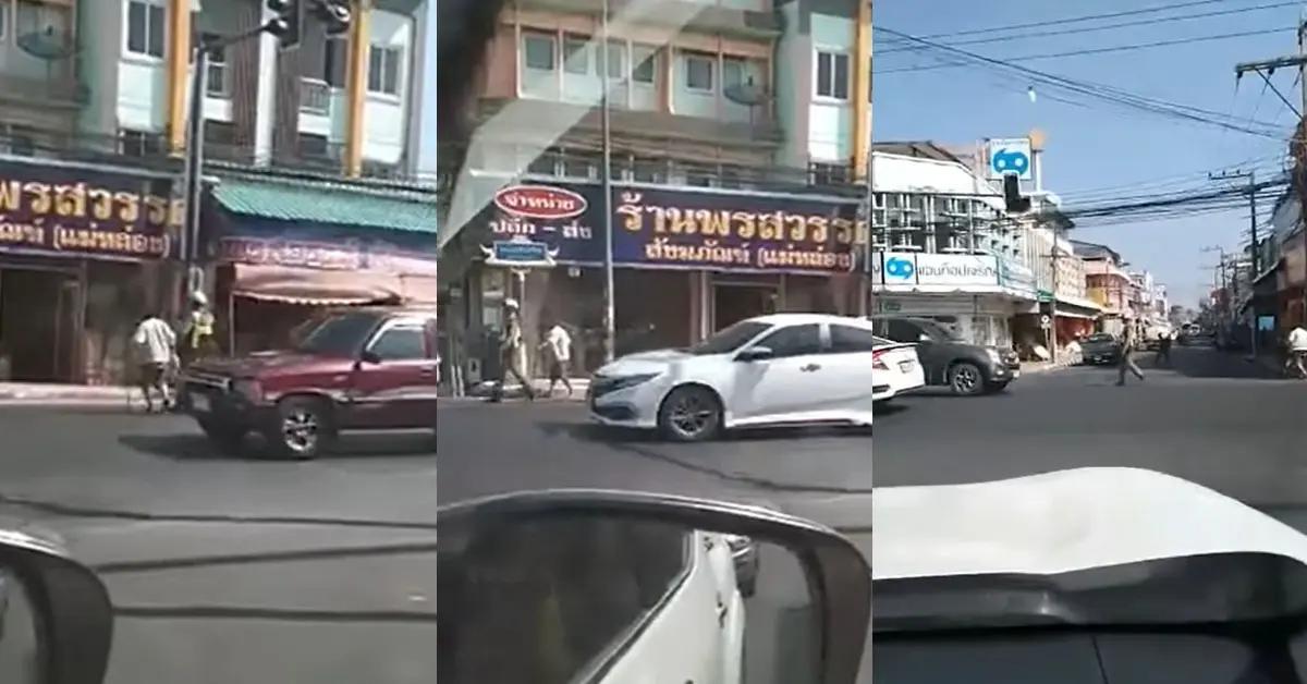 ตำรวจจูงมือป้าขามถนน