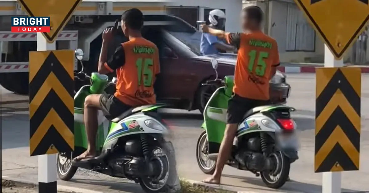หนุ่มถือปืนเล็งใส่รถ
