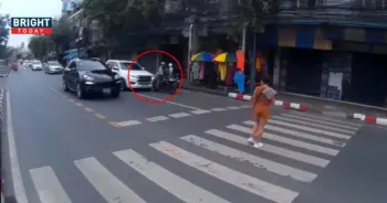 สาวข้ามถนนทางม้าลาย