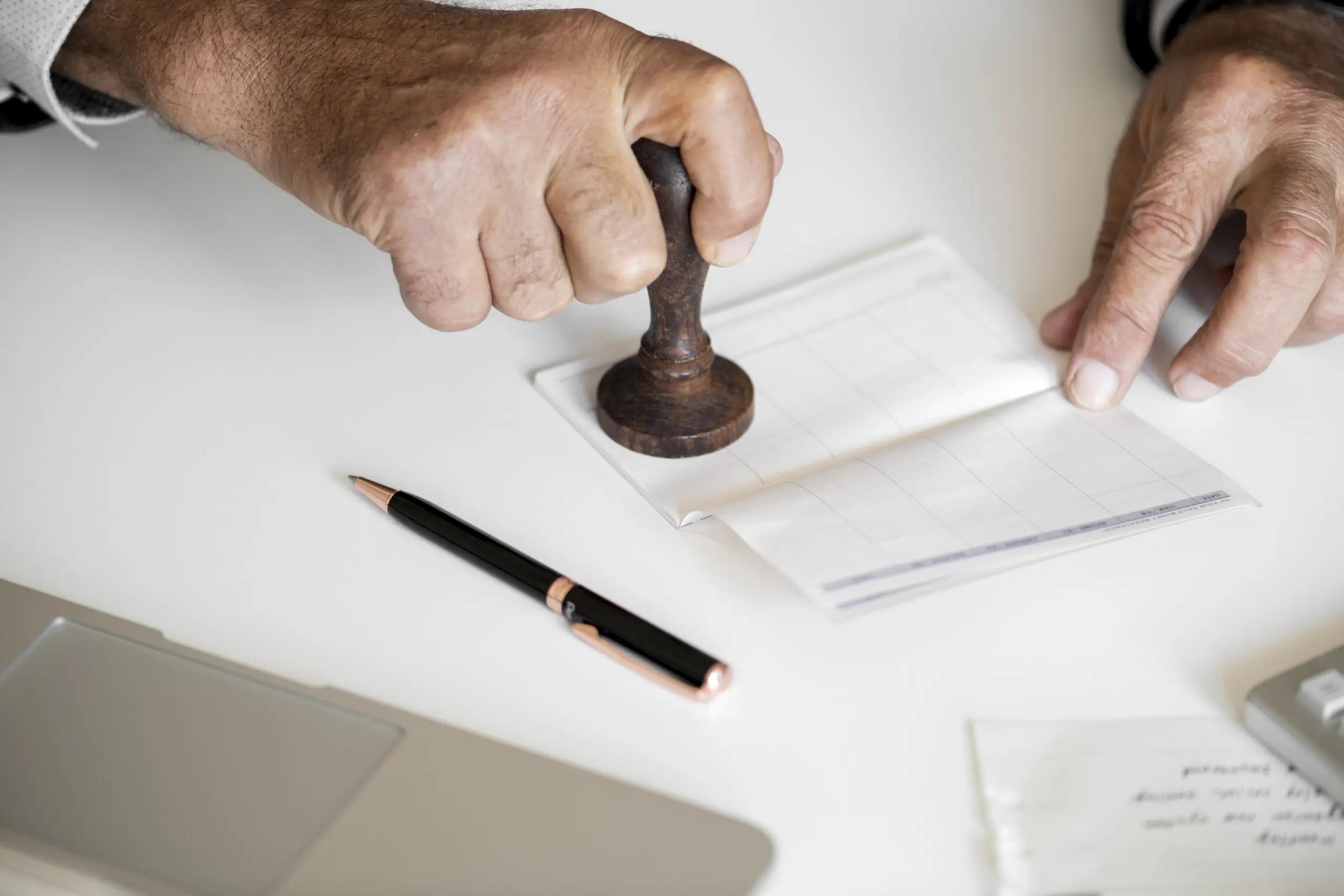 people-checking-bankbook-isolated-white-table