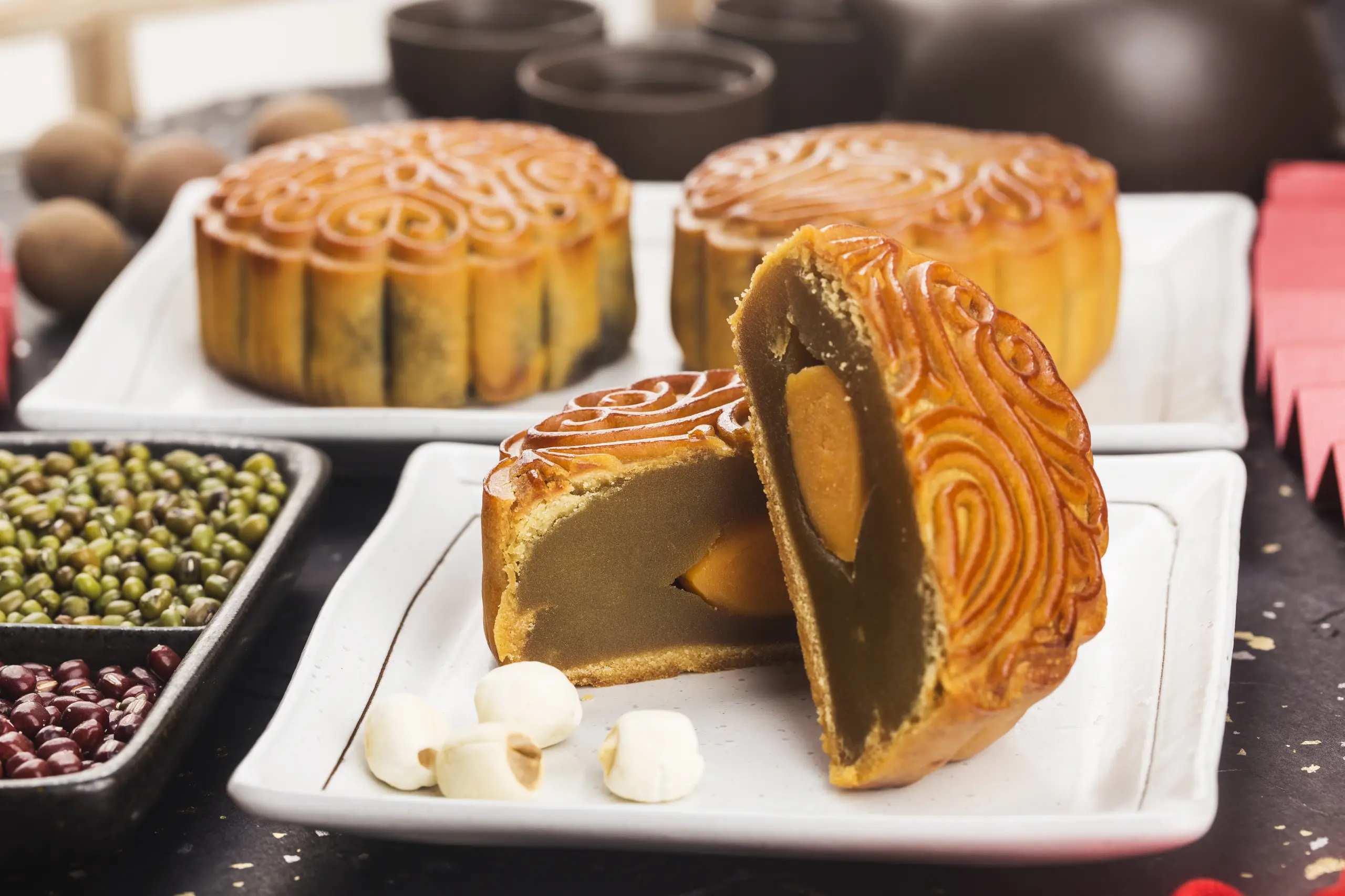 midautumn-festival-concept-traditional-mooncakes-table-with-teacup-1