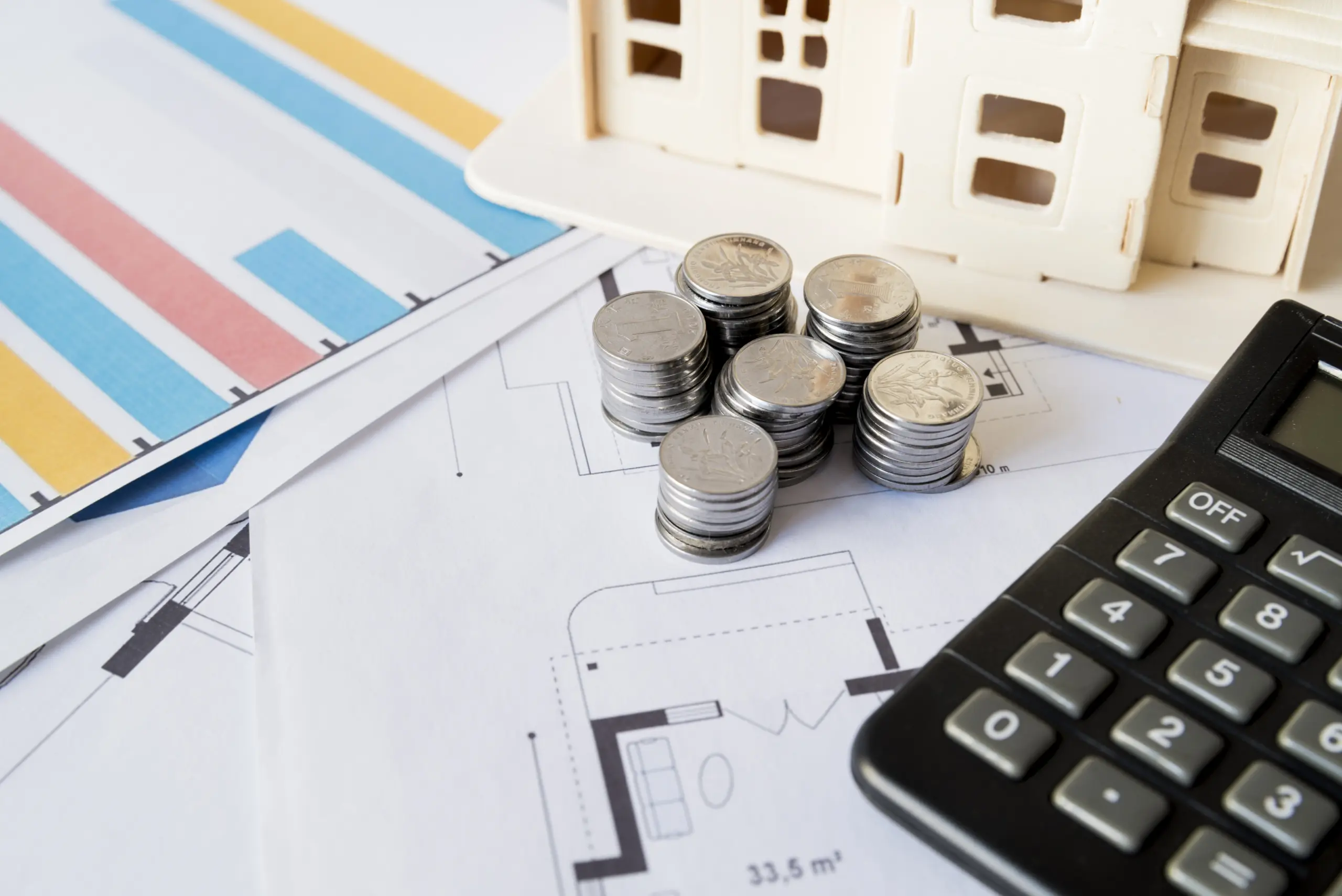 graph-stack-coins-calculator-house-model-blueprint