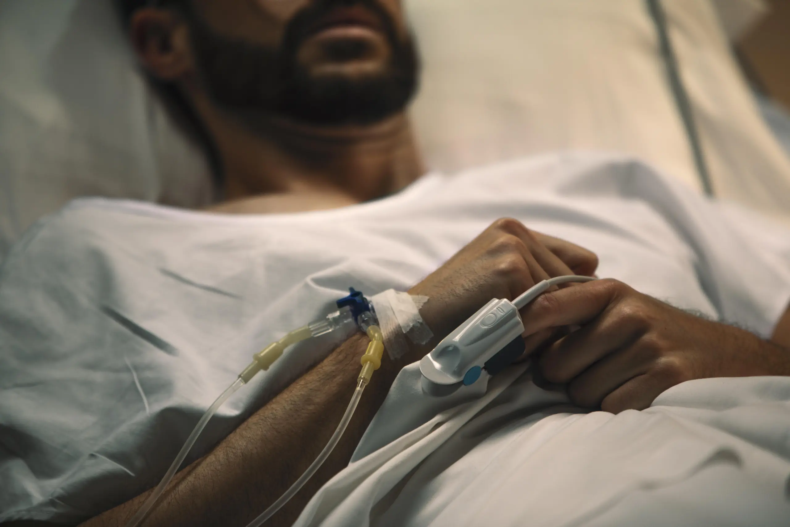young-man-being-ill-hospital-bed