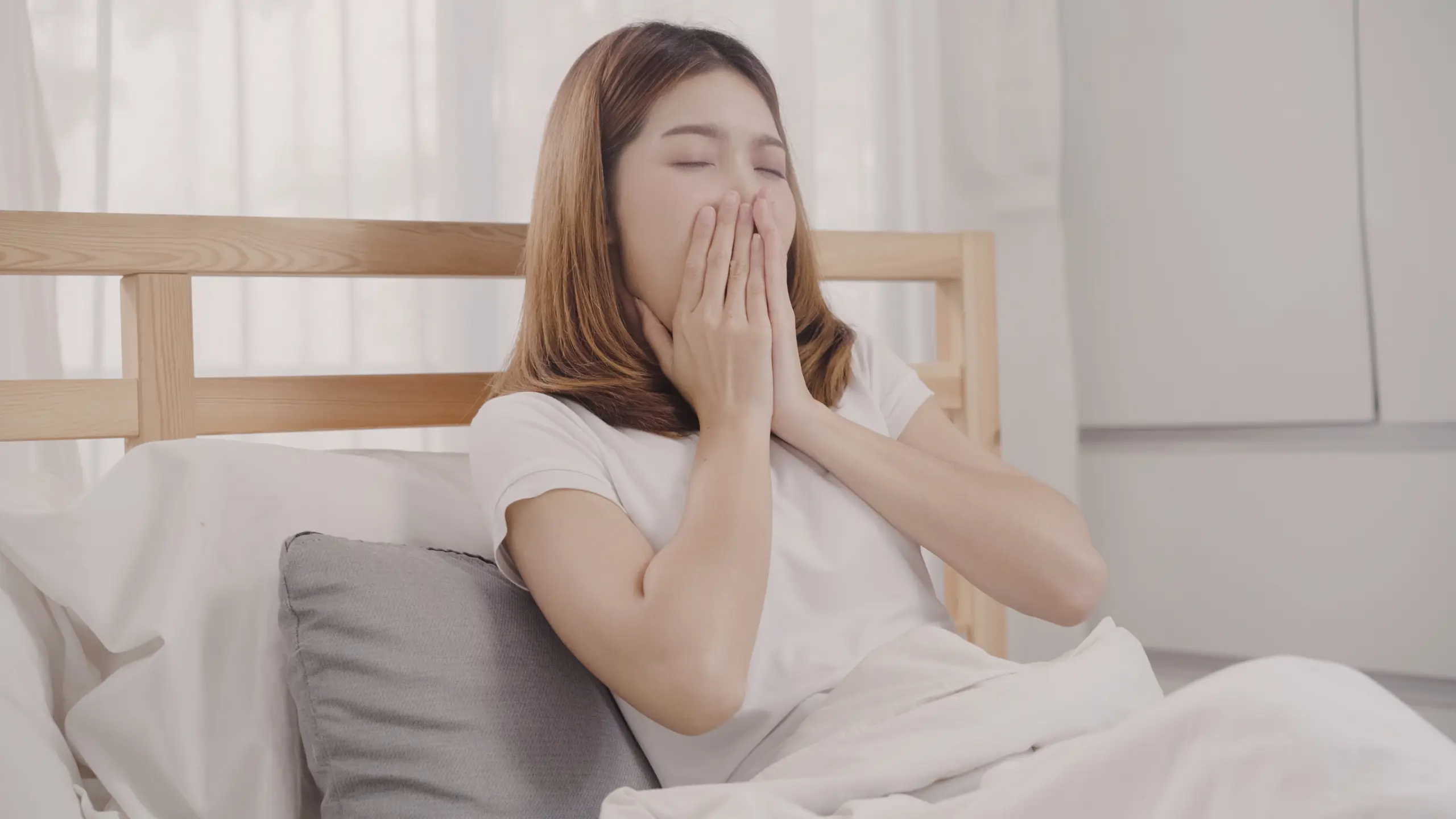 asian-woman-dreaming-while-sleeping-bed-bedroom